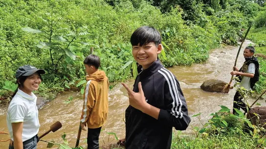 Youths by the river 