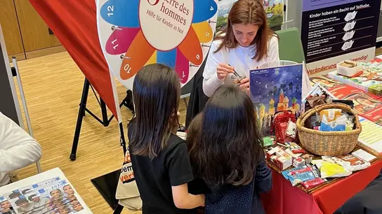 Stand zum Terre des Hommes-Aktionstag 2025 in München