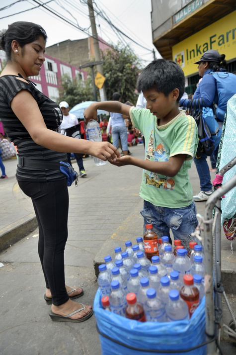Flaschenwasser-Verkäufer in Lima: Es geht um die Bedingungen der Arbeit